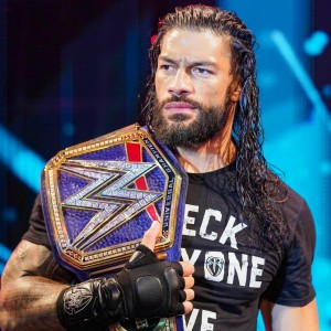 Roman Reigns hints at wrestling without vest or shirt this Sunday   WrestlingOnlinecom