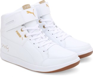 puma white and gold high tops