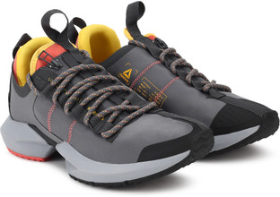 reebok running sole fury trainers in grey and orange