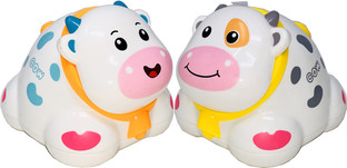 cow with toy car on head