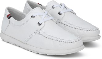 white slip on boat shoes