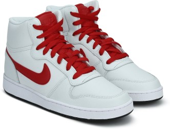 white and red nike shoes