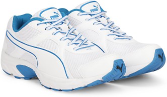 puma white and blue sport shoes