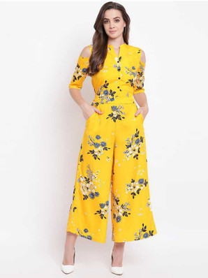black jumpsuit with yellow flowers