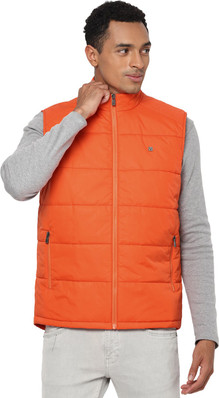 orange sleeveless jacket