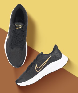 nike runners gold tick