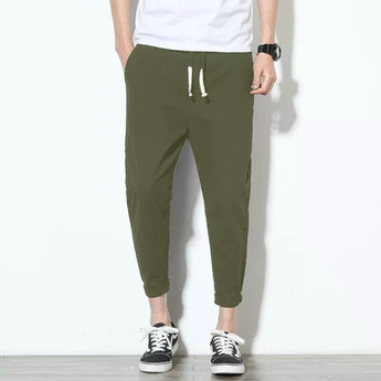 Coral Solid Men Green Track Pants 