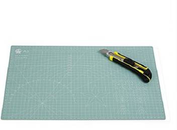Designers Den 9 Sea Cutting Mat A 3 Self Healing Flexible Mat With Marked Pattern Grids Mat Cutter With 4 Extra Blades Within Body Cutting Mat Price In India Buy Designers Den 9
