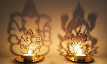 Qtsy Ganesh Ji Lakshmi Ji Shadow Lamps Tealight Candle Holder Stand For Pooja And Festival And For Diwali Copper Pack Of 2 Table Diya Set Price In India Buy Qtsy