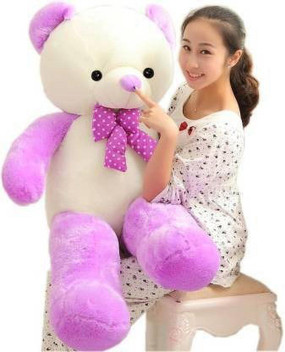 christmas teddy bear with year on foot