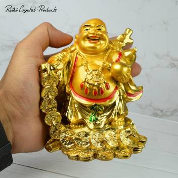 Feng Shui Laughing Buddha Golden color On Chair With Ingot And Money Coin
