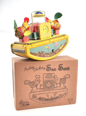 

Karmakara Pecking Chickens On A See Saw Wind-Up Wind Up Tin Toy In A Collectors Box(Yellow)