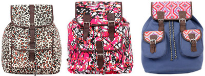 

Pick Pocket Combo of black and white animal printed canvas back pack with pink and black canvas back pack with blue canvas back pack with pink and red embroidered School Bag(Black, 5 inch)