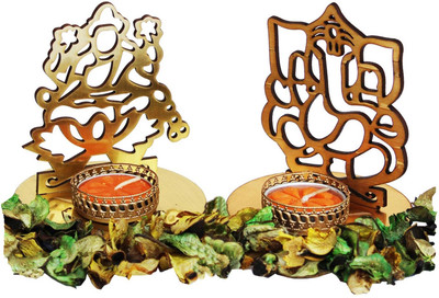 

Craft Junction HandMade Lord Ganesha and Lakshmi Ji Shadow Candle Wooden 2 - Cup Tealight Holder Set(Gold, Pack of 2)