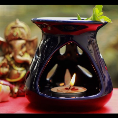 

Unravel India Ceramic Tealight Holder(Blue, Pack of 1)