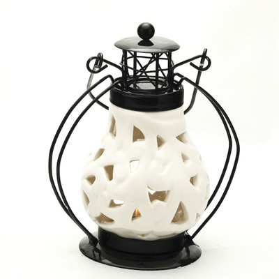 

Aapno Rajasthan Ceramic 1 - Cup Tealight Holder(Black, White, Pack of 1)