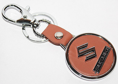 

Aura Imported Maruti Suzuki Metal & Leather Round Locking Key Chain(Brown)