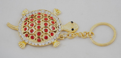 

Forty Creek Tortoise With Red & White Stone Key Chain(Multicolor)