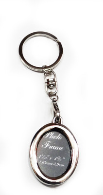 

Aditya Traders OVAL SHAPE PHOTO FRAME METAL KEYCHAIN Key Chain(Silver)