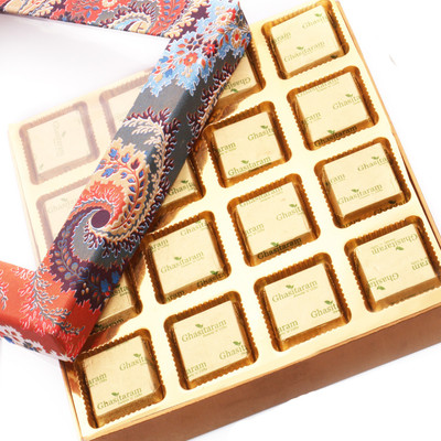 

Ghasitaram Gifts Blue Printed Assorted Chocolate Bars(Pack of 16, 250 g)