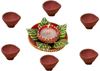 

Cretiv Diwali Earthenware (Pack of 7) Table Diya Set(Height: 3 inch)
