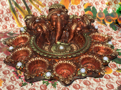 

AAMAYA GANESHA GOLDEN/GREEN DIYA SET Earthenware Table Diya Set(Height: 5 inch)