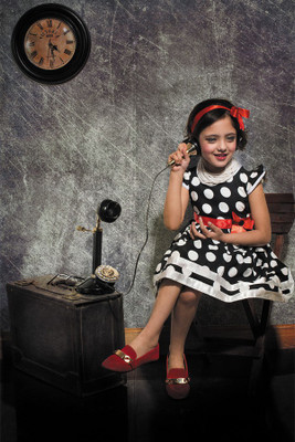 

RadhaKripa cute girl on phone Poster Paper Print(18 inch X 12 inch, Rolled)