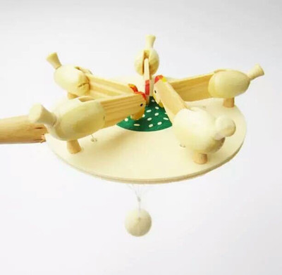 

Trinkets & More Wooden Pecking Chicken Toy | Chicken Paddle Toy | Swing Hanging Wood Ball for Kids 2+ Years(Multicolor)