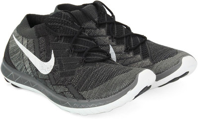 

Nike WMNS FREE .0 FLYKNIT Running Shoes For Women(Black, White, Grey, Black/white-anthracite-drk gry