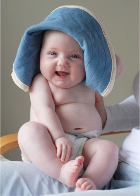 

Cute Baby Smiling with a blue colored cap on fine art paper 13x19 Fine Art Print(19 inch X 13 inch, Rolled)