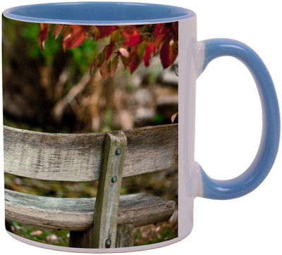 

Arkist child sitting on a bench Ceramic Mug(340 ml), Multicolor