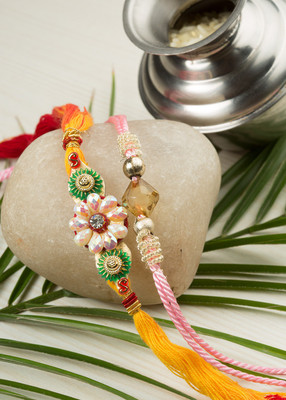 

Little India Thread Set(2 Fancy Rakhis,1 Pooja Coin,1 Greeting Card)