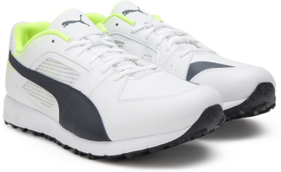 

Puma Team Rubber Men Cricket Shoes For Men(White, White-new navy-safety yellow