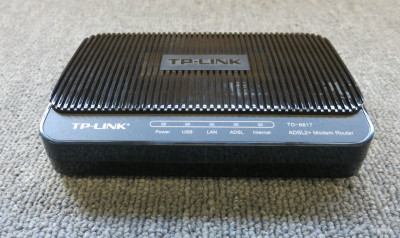 

TP-Link TP LINK TD-8817 Router(Black)