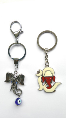 

Les Nouveautés Combo : Lord Ganesh Metallic Blue Stone studded Double Ring Keychain with Evil eye protection Hook Feng Shui Locking Key Chain (Blue) and Ganeshji in red and white stone with metal base:2 keychains Key Chain