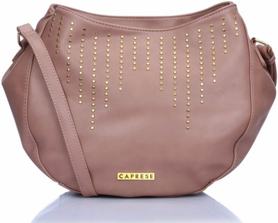

Caprese Women Casual Pink Leatherette Sling Bag