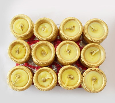 

Tied Ribbons Diwali Mutki candles set Terracotta (Pack of 12) Table Diya Set(Height: 2.7 inch)
