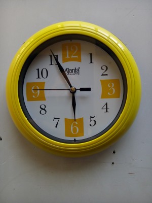 

Ajanta Analog 17 cm X 3 cm Wall Clock(Yellow, With Glass)