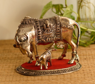 

eCraftIndia Decorative Cow with Calf statue Decorative Showpiece - 17.78 cm(Aluminium, Silver, Red)