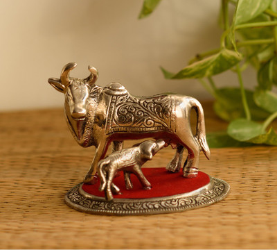 

eCraftIndia Metal Cow and Calf Decorative Showpiece - 10.2 cm(Red, Silver)