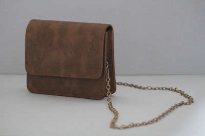 

Thou Art th001r Waterproof Sling Bag(Brown, 5 inch)
