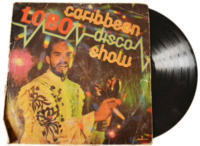 

Artlivo VINTAGE Gramophone Record - Caribbean LOBO Disco Show (With Cover) Decorative Showpiece - 1 cm(Plastic, Multicolor)