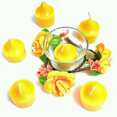 

Reyansh Collection YELLOW Fragrance Candle set of 6 candles and one pot and flower garland Candle ( Pack of 1) Candle(Yellow, Pack of 1)