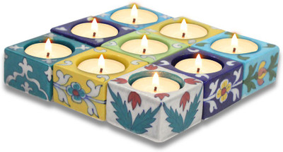 

India Meets India Blue Pottery Art Handmade Decorative Diyas Or Ceramic Diya Set/Tealight Holder with Tealights Candles Qty -9 (0105HOBP00033) Ceramic 9 - Cup Candle Holder(Multicolor, Pack of 9)