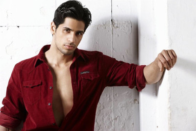 

Aabhaas Wall Poster Siddhh Malhotra Red Shirt Paper Print(12 inch X 18 inch, Rolled)