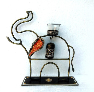 

VedasExports Upper Trunk Elephant T-Light Decorative Showpiece - 32.5 cm(Iron, Multicolor)