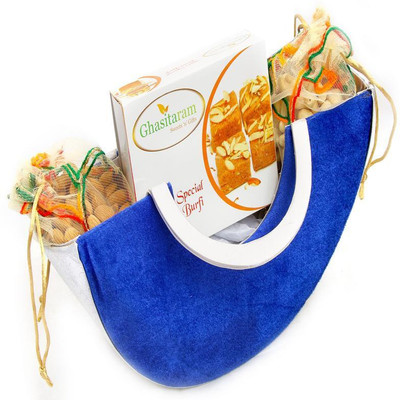 

Ghasitaram Gifts Blue Moon Basket Hamper of Besan Barfi, Almonds and Cashews Combo