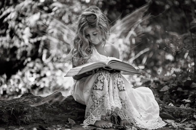 

People Little girl in white dress with book black and white photo on LARGE PRINT 36X24 INCHES Photographic Paper(24 inch X 36 inch, Rolled)