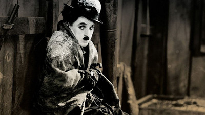 

Movie The Gold Rush CHARLEY CHAPLIN2 on fine art paper 13x19 Paper Print(19 inch X 13 inch, Rolled)