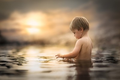 

People Children The little boy bathes in water on fine art paper 13x19 Paper Print(19 inch X 13 inch, Rolled)